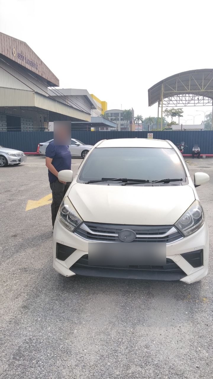 Perodua Axia — KOI handover photo 1